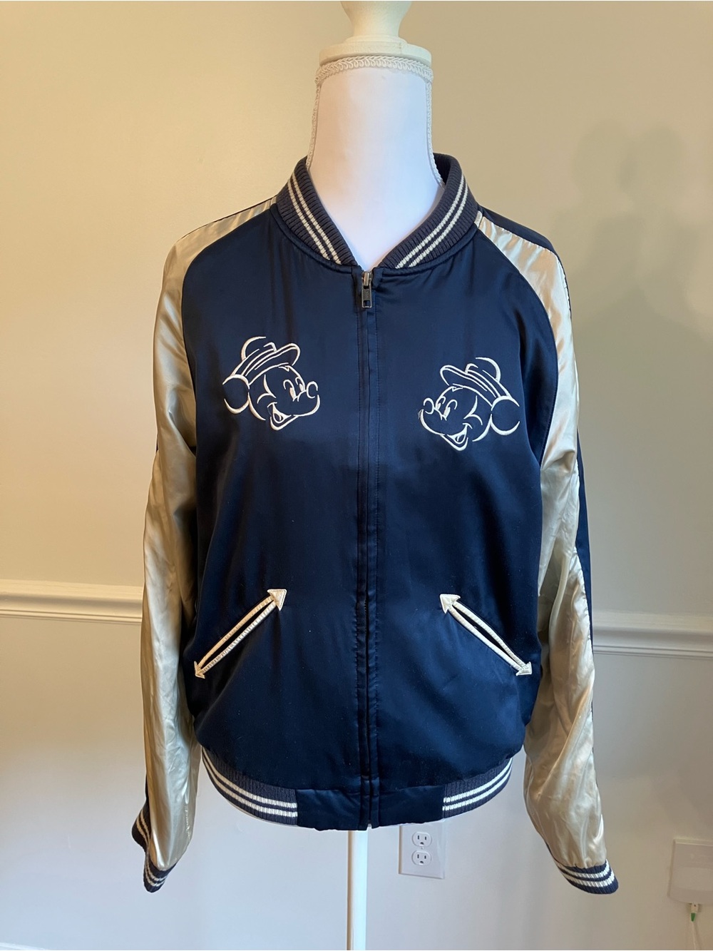 Uniqlo x Disney collab navy and cream varsity jacket